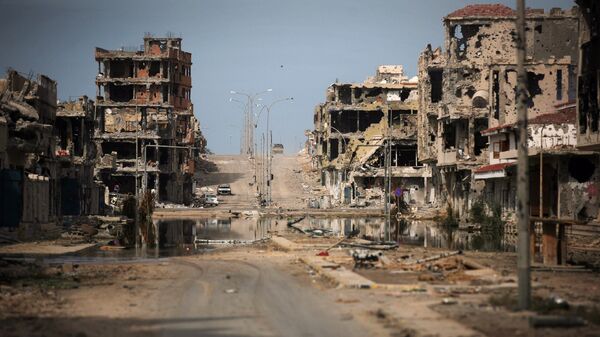 Las ruinas en la ciudad libia de Sirte - Sputnik Mundo