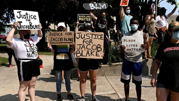 Las protestas contra la brutalidad policial y la discriminación racial en Wisconsin, EEUU - Sputnik Mundo