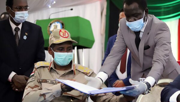 La firma de paz en Sudán - Sputnik Mundo