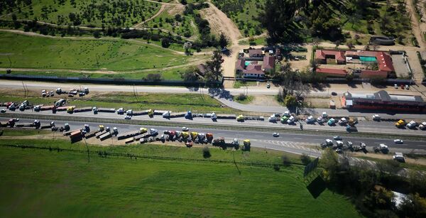 Camioneros en Chile: ¿una movilización política o gremial? Camioneros en Chile: ¿una movilización política o gremial? - Sputnik Mundo
