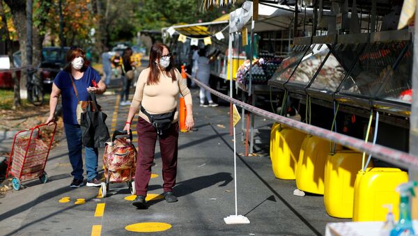 Las mujeres en mascarillas en Buenos Aires, Argentina - Sputnik Mundo