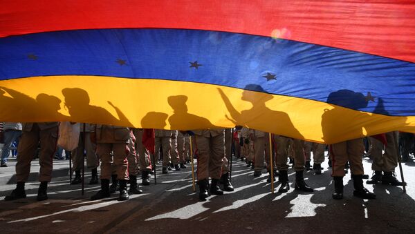 Miembros de la milicia bolivariana asisten a una marcha en apoyo al presidente venezolano Nicolás Maduro. Caracas, 14 de enero de 2020 - Sputnik Mundo