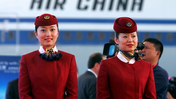 Unas azafatas de la aerolínea china Air China - Sputnik Mundo