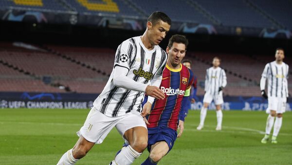 Cristiano Ronaldo y Lionel Messi  - Sputnik Mundo