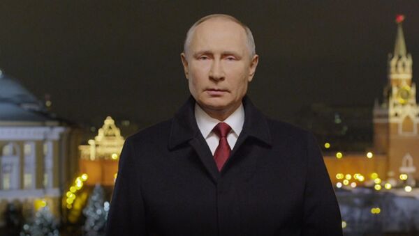 El presidente de Rusia, Vladímir Putin, felicitando a los ciudadanos del país por el 2021 - Sputnik Mundo