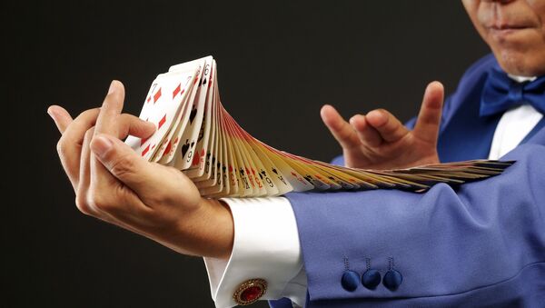 Un truco con cartas, imagen ilustrativa - Sputnik Mundo