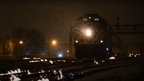 Vías en llamas del sistema ferroviario de cercanías de Chicago - Sputnik Mundo