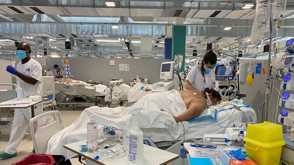 Pabellón de cuidados intermedios en Hospital de pandemia Isabel Zendal de Madrid  - Sputnik Mundo
