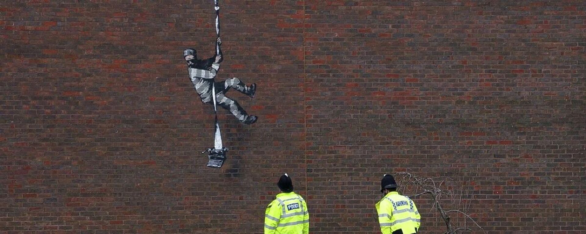 El grafiti de Banksy en la pared de la cárcel de Reading - Sputnik Mundo, 1920, 05.03.2021