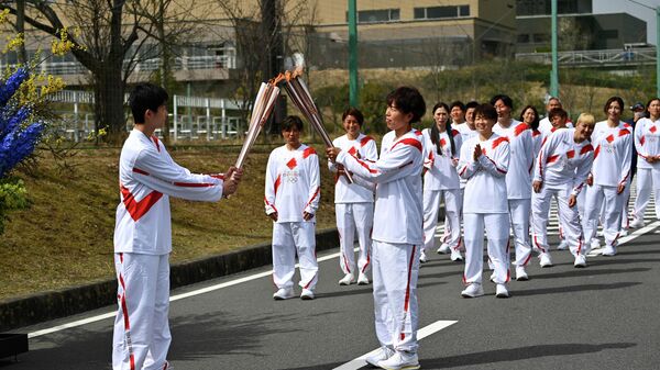 La ceremonia de relevo de la antorcha olímpica en Japón - Sputnik Mundo