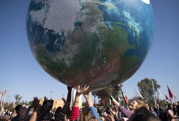 Los participantes en la 22 Conferencia Mundial de la ONU sobre el Cambio Climático en Marrakech, Marruecos. - Sputnik Mundo