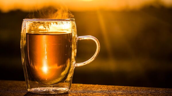 Una taza de té caliente - Sputnik Mundo