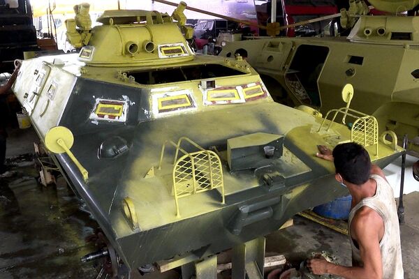 Reparación de vehículos blindados en Venezuela Reparación de vehículos blindados en Venezuela - Sputnik Mundo