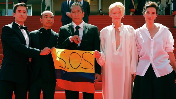 Los actores y directores de la película 'Memoria' desfilan por la alfombra roja de la 74 edición del festival de Cannes - Sputnik Mundo