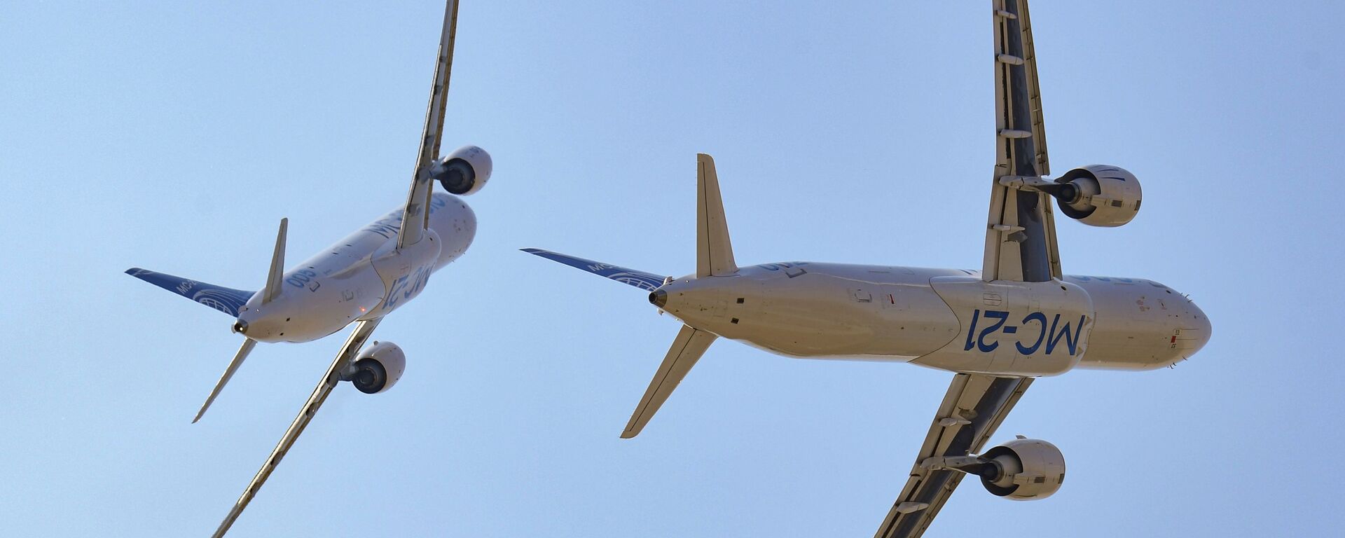 Пассажирские самолеты МС-21-300 и МС-21-310 во время выполнения летной программы на Международном авиационно-космическом салоне МАКС-2021 - Sputnik Mundo, 1920, 03.08.2021