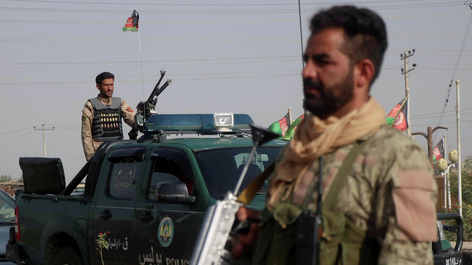 Las fuerzas de seguridad afganas vigilan un puesto de control en el distrito Guzara de la provincia de Herat, Afganistán, el 9 de julio de 2021 - Sputnik Mundo, 1920, 09.08.2021