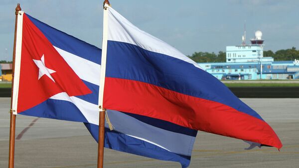 Banderas de Rusia y Cuba - Sputnik Mundo