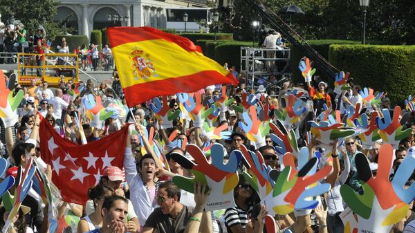 Madrileños apoyando la candidatura de su ciudad para acoger los Juegos Olímpicos de 2016 - Sputnik Mundo