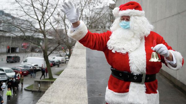 El Papá Noel en Bruselas, Bélgica, el 24 de diciembre - Sputnik Mundo