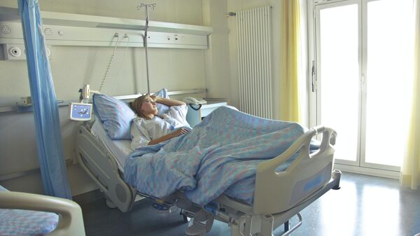 Imagen referencial de una paciente de hospital - Sputnik Mundo