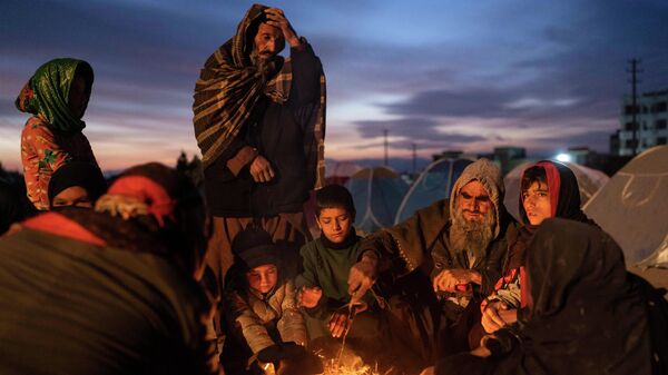 Una familia afgana - Sputnik Mundo
