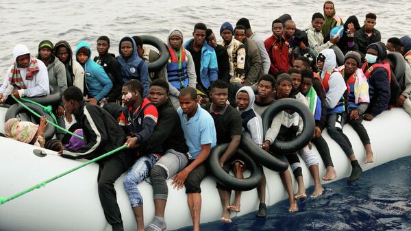 Migrantes detenidos en Libia - Sputnik Mundo