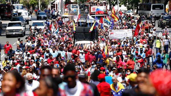 Miles de trabajadoras y trabajadores marcharon en Caracas para conmemorar 1 de Mayo - Sputnik Mundo