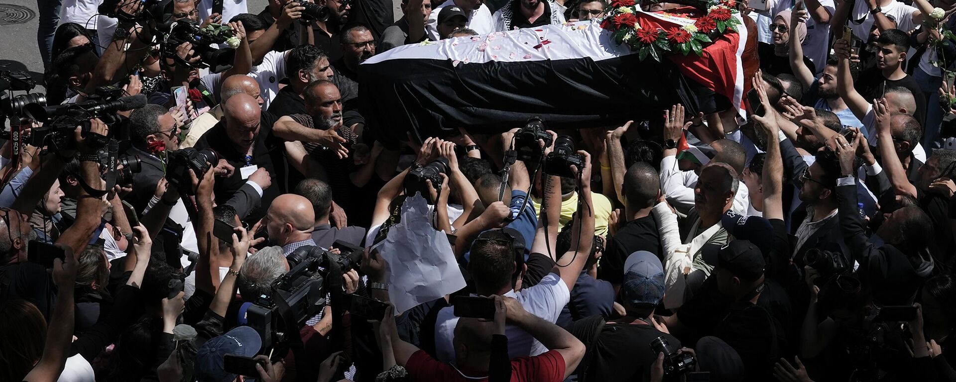 Comienza en Jerusalén el funeral de la periodista de 'Al Jazeera'  - Sputnik Mundo, 1920, 13.05.2022