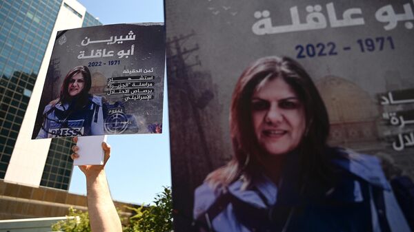 Fotos de la reportera de la cadena 'Al Jazeera', Shirin Abu Akleh - Sputnik Mundo