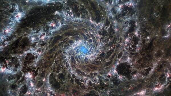 La imagen de la Galaxia Fantasma tomada por el telescopio James Webb - Sputnik Mundo