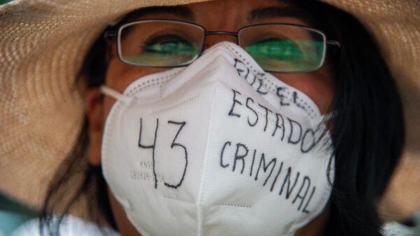 La gente lucha por la justicia en el caso Ayotzinapa (archivo) - Sputnik Mundo