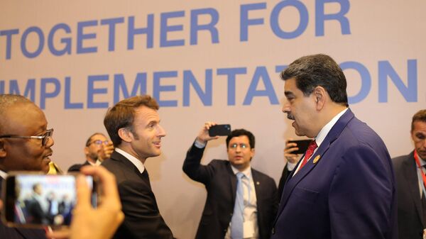 Los presidentes de Francia y Venezuela, Emmanuel Macron y Nicolás Maduro, de izquierda a derecha.  - Sputnik Mundo