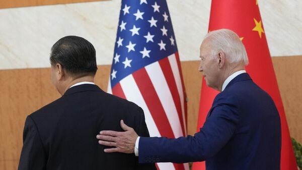 Xi Jinping y Joe Biden - Sputnik Mundo