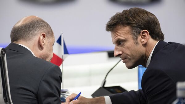 Los líderes de Alemania y Francia, Olaf Scholz y Emmanuel Macron - Sputnik Mundo