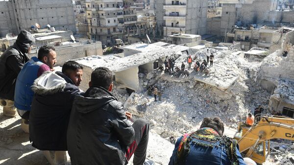 El colapso de un edificio residencial en Siria  - Sputnik Mundo