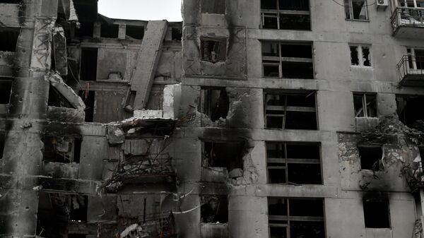 Un edificio destruido - Sputnik Mundo