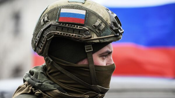 Un militar ruso - Sputnik Mundo