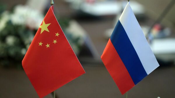 Las banderas de China y Rusia  - Sputnik Mundo