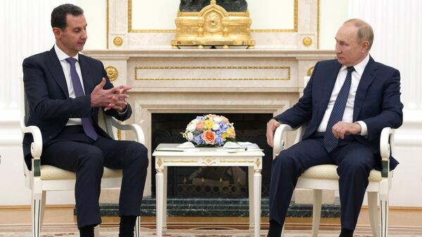 El presidente de Rusia, Vladímir Putin, en la reunión con el presidente de Siria, Bashar Asad, en 2021 (archivo) - Sputnik Mundo