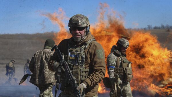 Unidades de una de las brigadas de defensa territorial participan en ejercicios militares en Ucrania, el 14 de marzo de 2023 - Sputnik Mundo