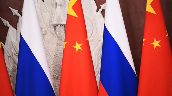 Las banderas de Rusia y China - Sputnik Mundo