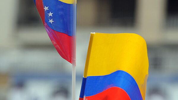 Banderas de Venezuela y Colombia - Sputnik Mundo