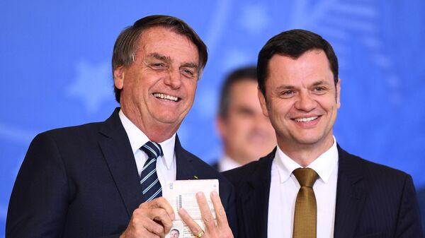El expresidente Jair Bolsonaro y el exministro de Justicia Anderson Torres - Sputnik Mundo