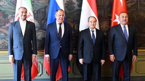 Los ministros de Asuntos Exteriores ruso, sirio, iraní y turco se reúnen para tratar el acuerdo de paz sirio, el 10 de mayo, 2023 - Sputnik Mundo