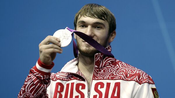 El medallista ruso en halterofilia Apti Aukhadov - Sputnik Mundo