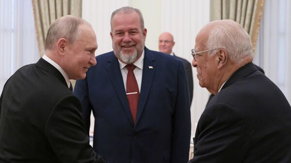 El presidente ruso, Vladimir Putin, el primer ministro cubano, Manuel Marrero Cruz, y el viceprimer ministro de la República de Cuba, Ricardo Cabrisas Ruiz  - Sputnik Mundo