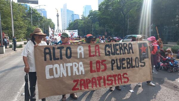 El pasado 8 de junio cientos de personas marcharon en la CDMX y otras ciudades para exigir un freno a las agresiones contra comunidades zapatistas en Chiapas.  - Sputnik Mundo
