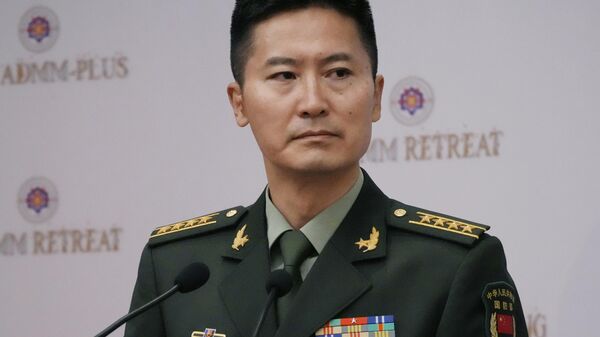 El portavoz del Ministerio de Defensa chino, Tan Kefei  - Sputnik Mundo