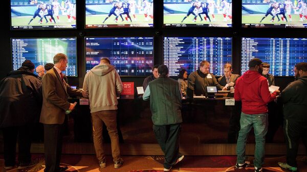 Sector de apuestas deportivas en un casino de la ciudad de Filadelfia, en EEUU - Sputnik Mundo