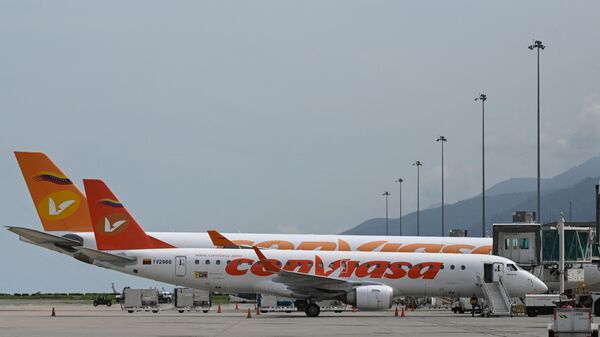 Aviones de Conviasa Airlines son fotografiados en el Aeropuerto Internacional Simón Bolívar, Venezuela  - Sputnik Mundo